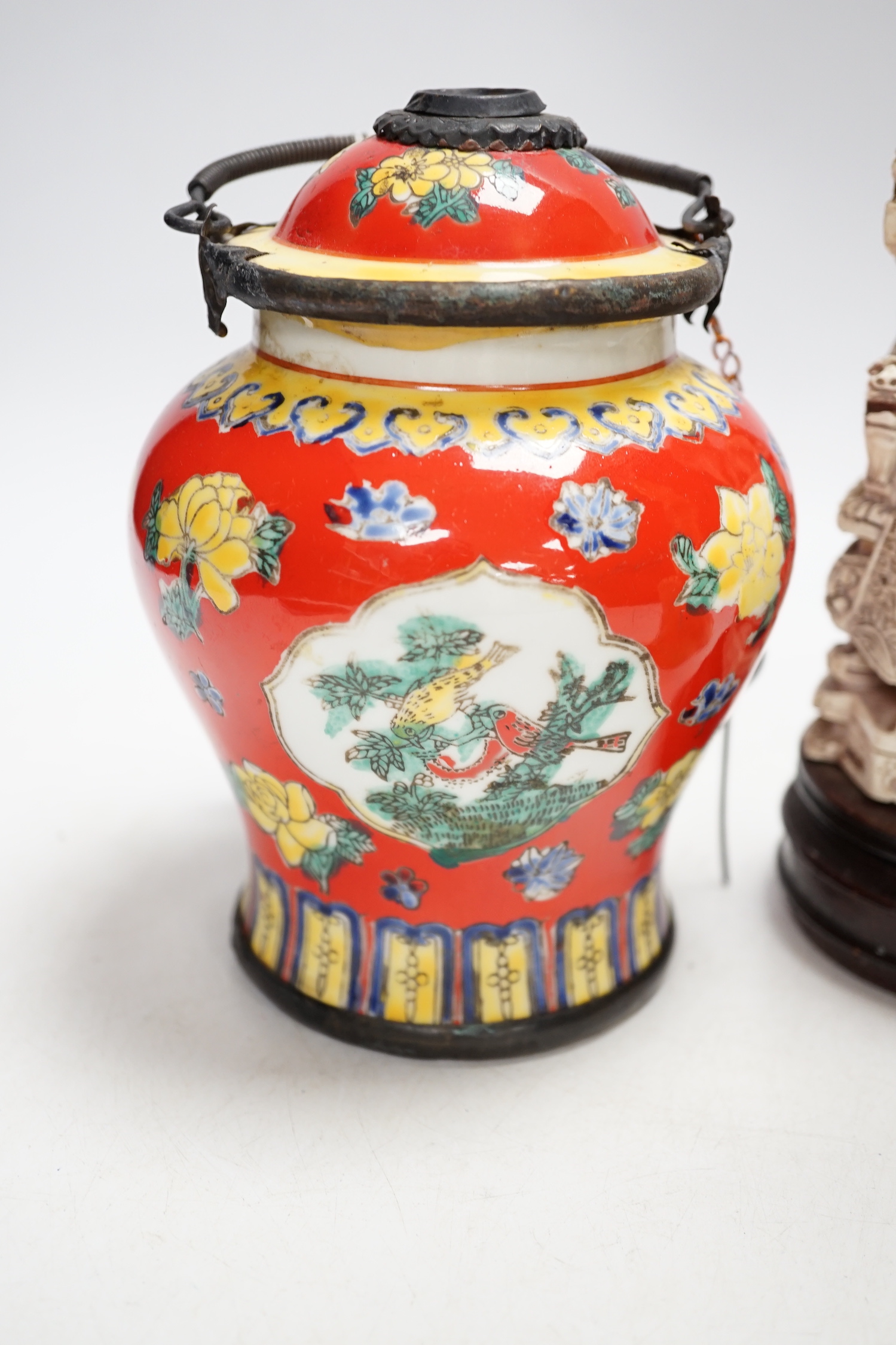 A group of Chinese ceramics 18th century and later, including a bottle vase, a water pipe vessel, box and cover, three bowls, a Tang style figure of a lady, a Yixing teapot, together with a resin figure of an emperor